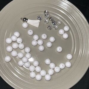40 White Round Beads with Tassel and Rhinestone Accents